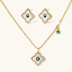 Gold-plated jewelry set with diamond-shaped pendants featuring white centers, green stones, and sparkling zirconia borders