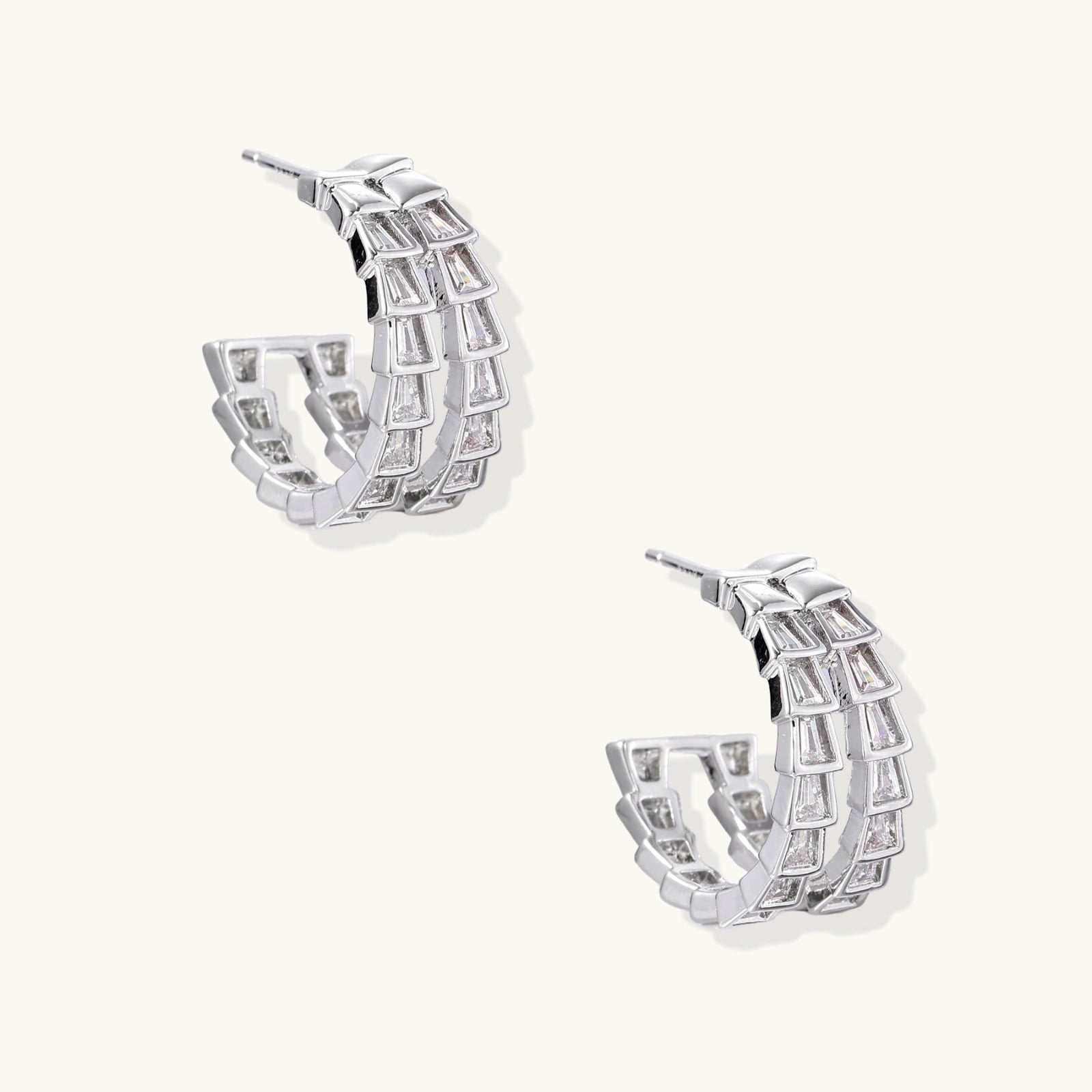 White gold-plated hoop earrings with double row of baguette-cut zirconia stones in geometric ladder design