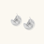 Brushed sterling silver cushion-shaped stud earrings with matte finish on white background